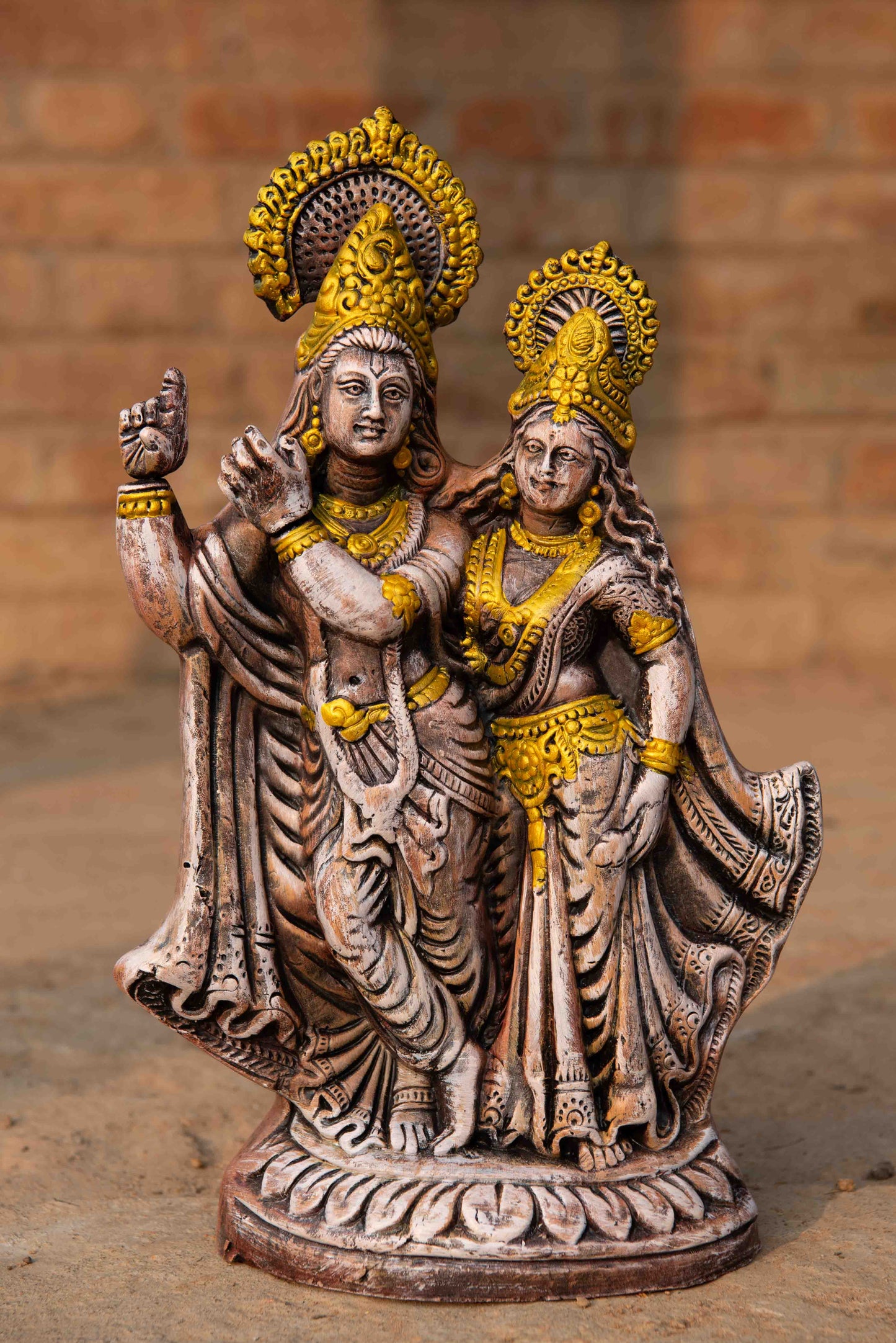 Colored Terracotta Radha Krishna Sculpture