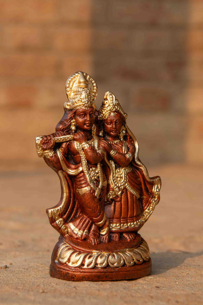 Colored Terracotta Radha Krishna Sculpture