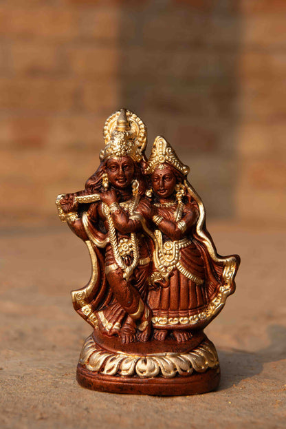 Colored Terracotta Radha Krishna Sculpture